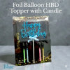 Foil balloon topper with candle
